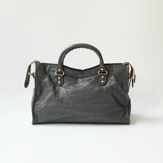 Balenciaga Classic City grey bag back view with gold hardware, smooth leather panel with detachable shoulder strap