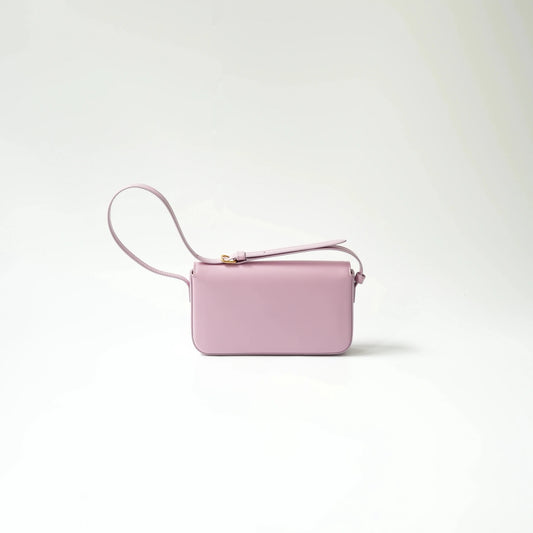 Back view of lavender shiny calfskin Triomphe bag with gold Triomphe clasp and adjustable matching leather strap.