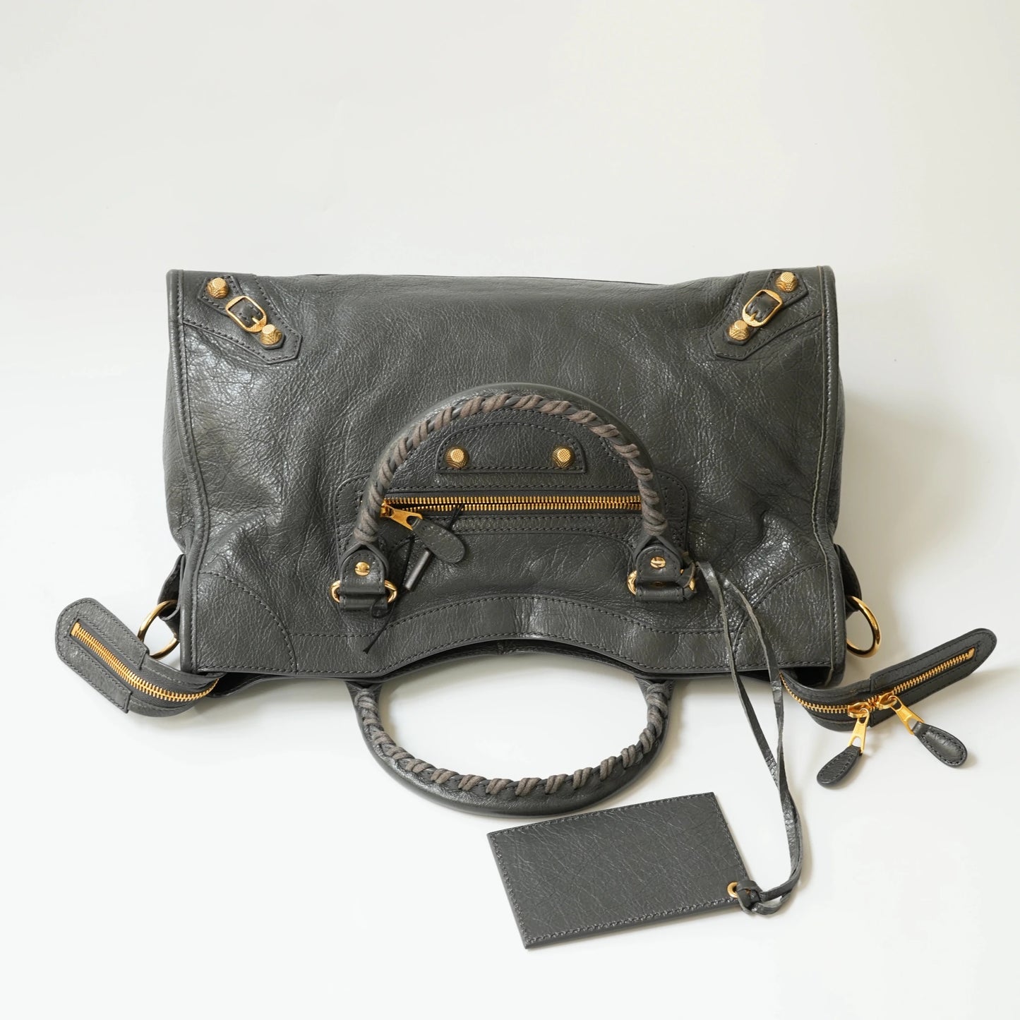 Grey Balenciaga Classic City bag top view with gold hardware, top zip closure, wide opening for daily use