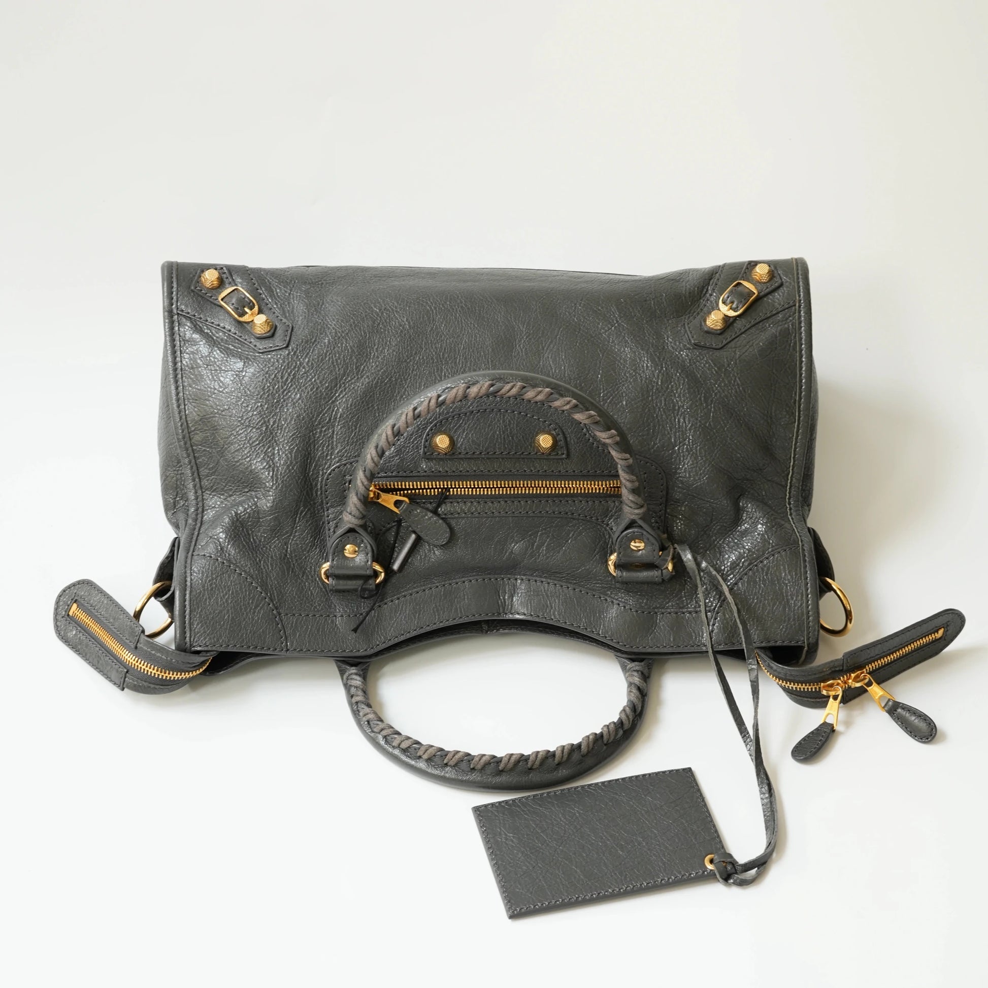 Grey Balenciaga Classic City bag top view with gold hardware, top zip closure, wide opening for daily use