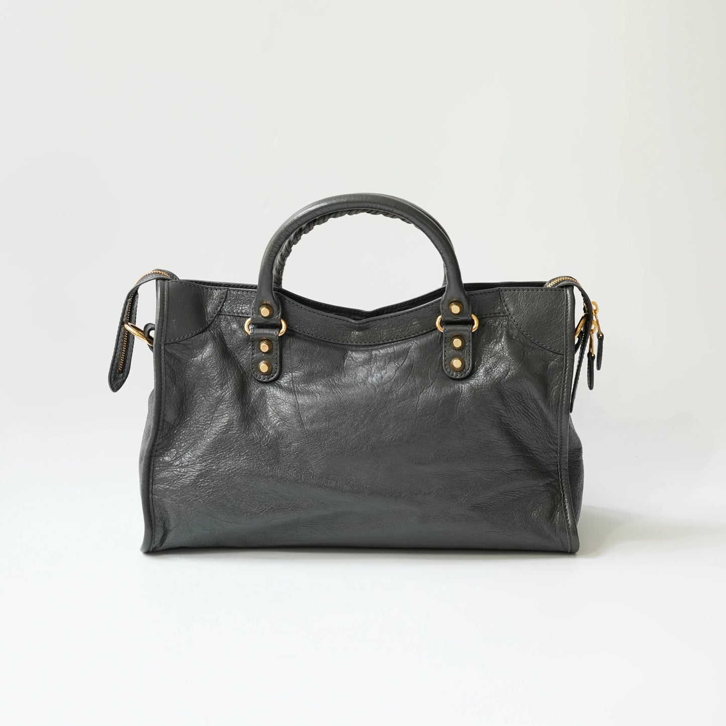Balenciaga Classic City grey bag back view with gold hardware, smooth leather panel with detachable shoulder strap