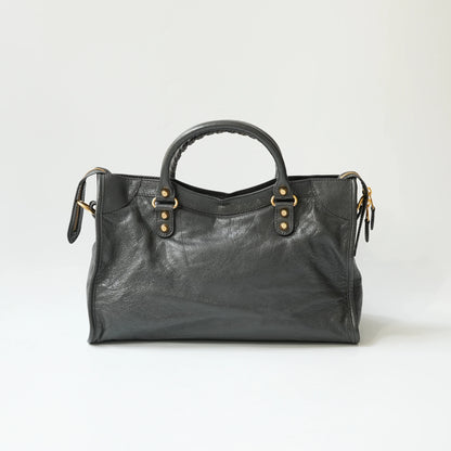 Balenciaga Classic City grey bag back view with gold hardware, smooth leather panel with detachable shoulder strap