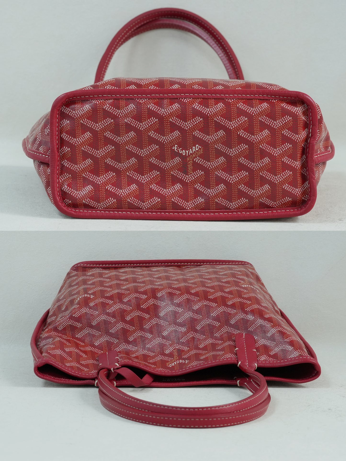 Top view of the red Goyardine herringbone canvas mini reversible tote bag, featuring calfskin trim and double handles.