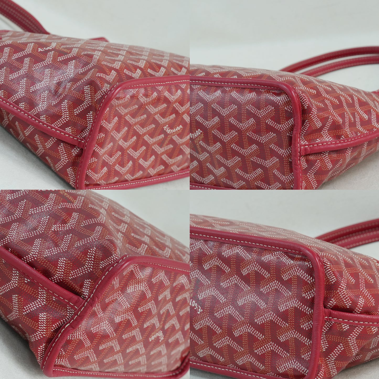 Bottom view of the red Goyardine herringbone canvas mini reversible tote bag, featuring calfskin trim and double handles.