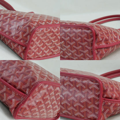 Bottom view of the red Goyardine herringbone canvas mini reversible tote bag, featuring calfskin trim and double handles.