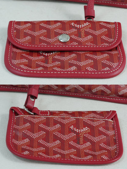 Includes small pouch of the red Goyardine herringbone canvas mini reversible tote bag, featuring calfskin trim and double handles.