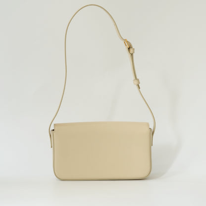 Back view of Celine Triomphe shoulder bag in ivory shiny calfskin