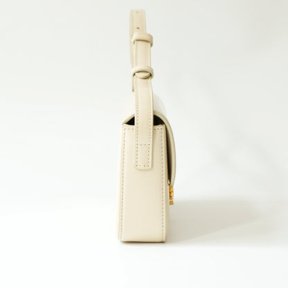 Side view of Celine Triomphe shoulder bag showing thickness and strap