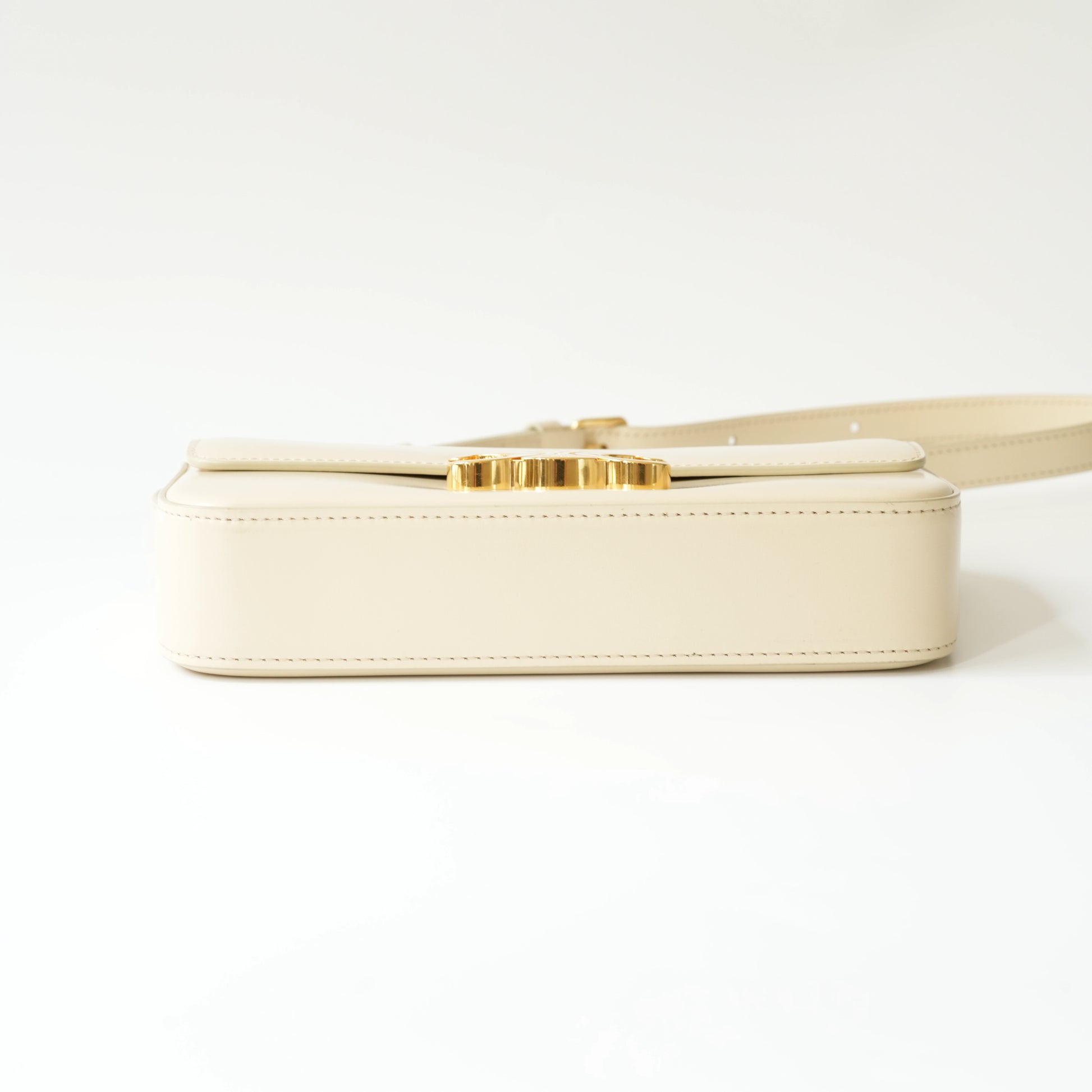 Bottom view of Celine Triomphe shoulder bag with flat structured base