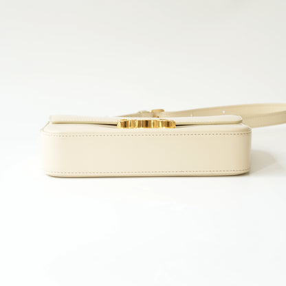 Bottom view of Celine Triomphe shoulder bag with flat structured base