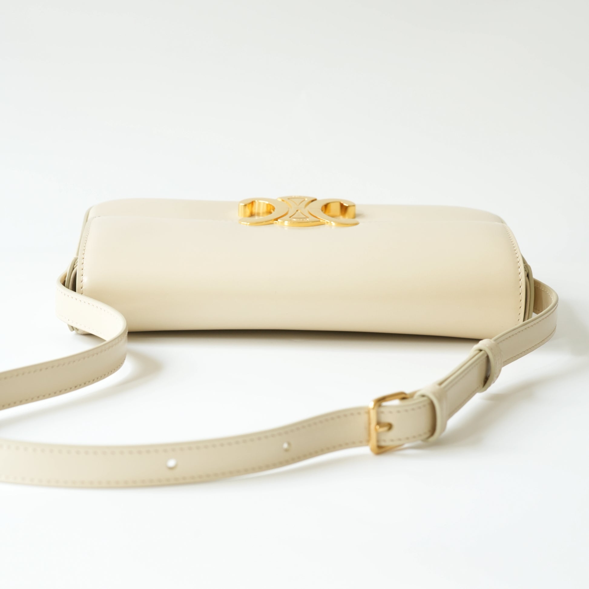 Top view of Celine Triomphe shoulder bag with adjustable leather strap