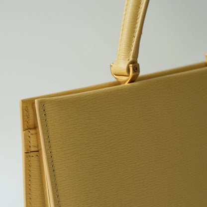 Detail view of Celine clasp bag precision leather stitching and high-shine metal hardware