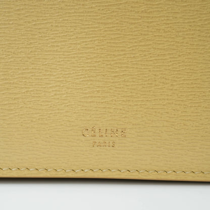Detail view of Celine clasp bag precision leather stitching and high-shine metal hardware