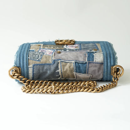 Top view of Chanel Boy bag with aged gold chain and leather shoulder pad