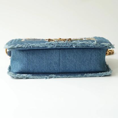 Bottom view of Chanel Boy bag with structured denim base