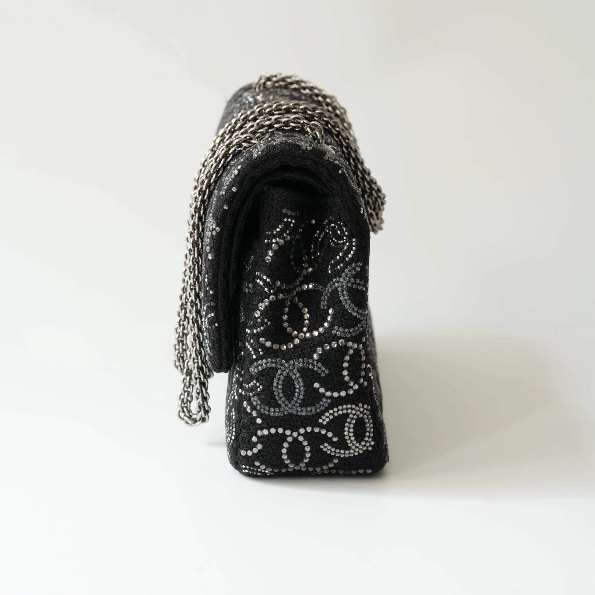 Side view of Chanel classic flap bag showing depth and structure