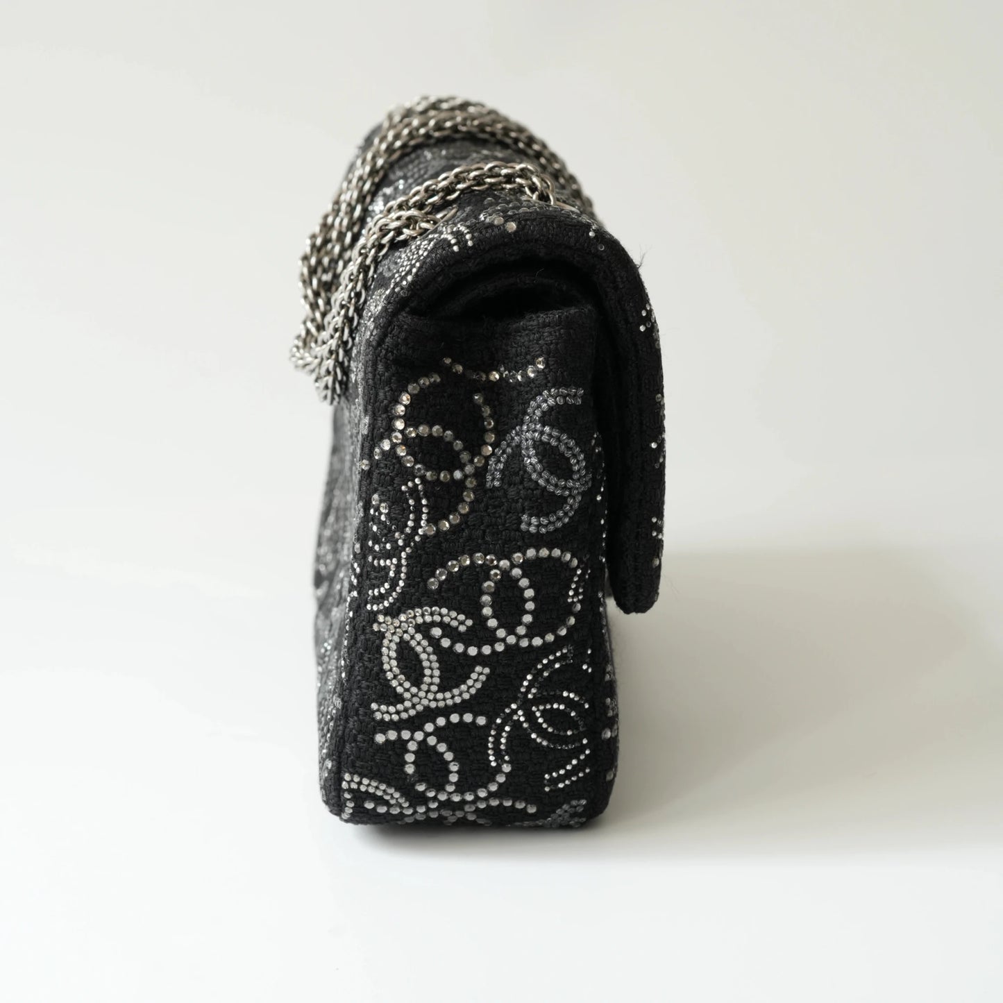 Side view of Chanel classic flap bag showing depth and structure