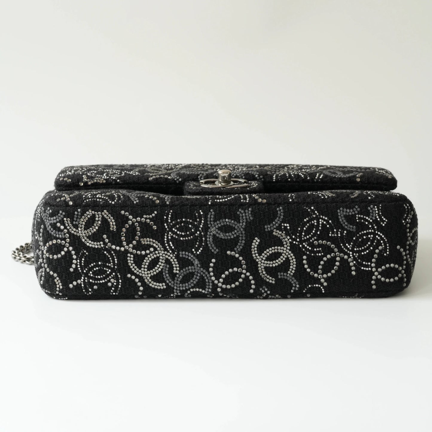 Bottom view of Chanel classic flap bag with structured base