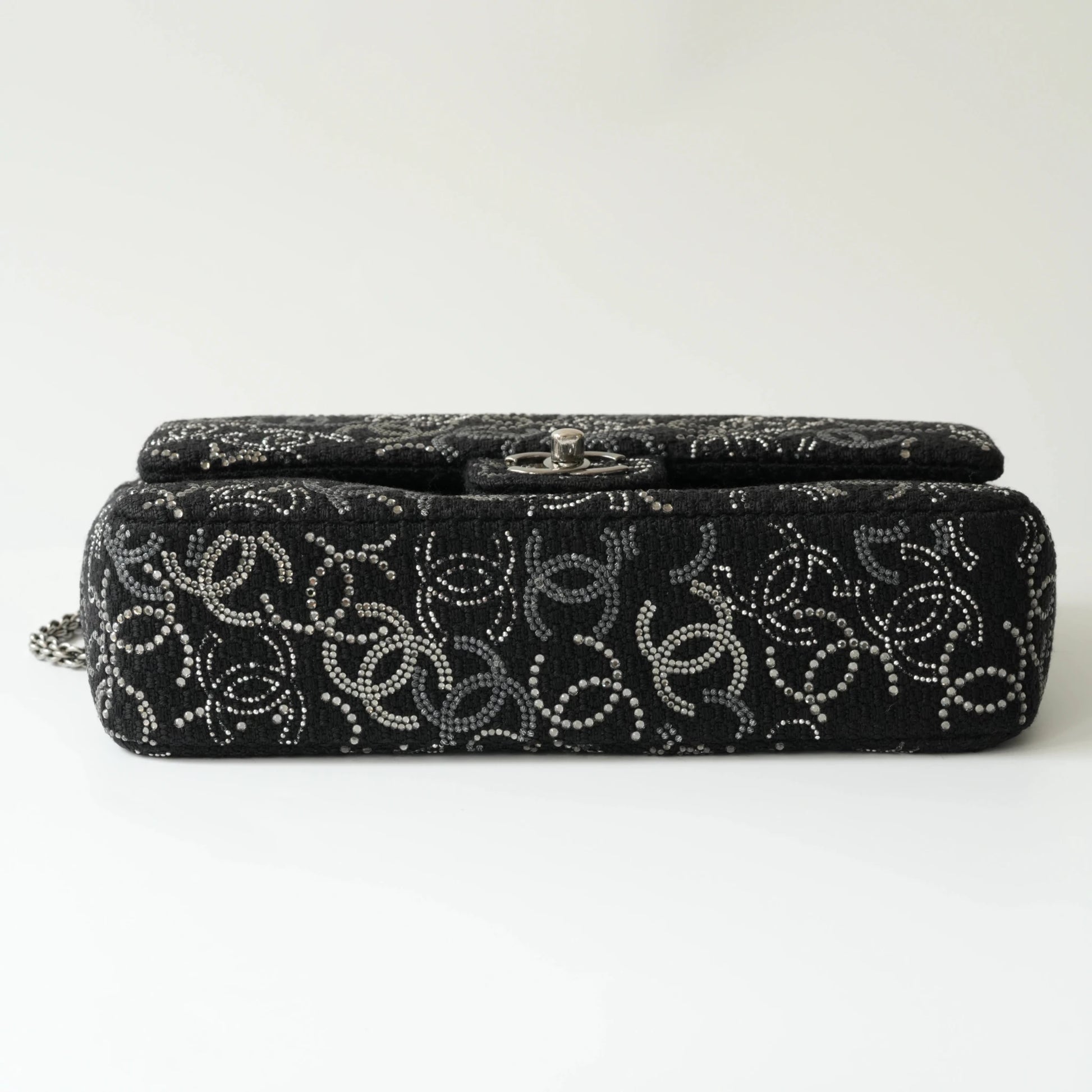 Bottom view of Chanel classic flap bag with structured base