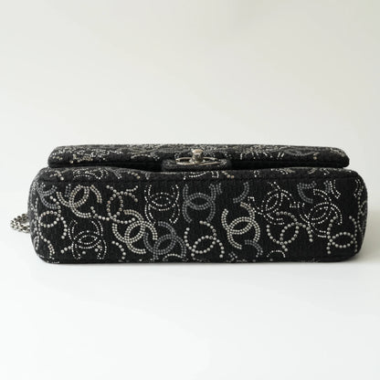 Bottom view of Chanel classic flap bag with structured base