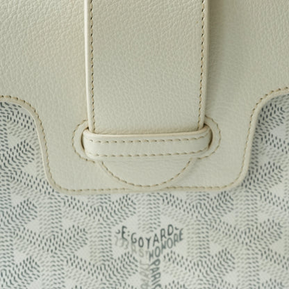 Detail view of beech wood handle and Goyardine chevron monogram pattern