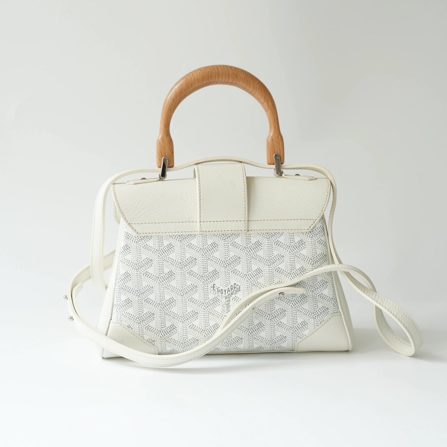 Back view of Goyard Mini Saigon bag in white Goyardine canvas