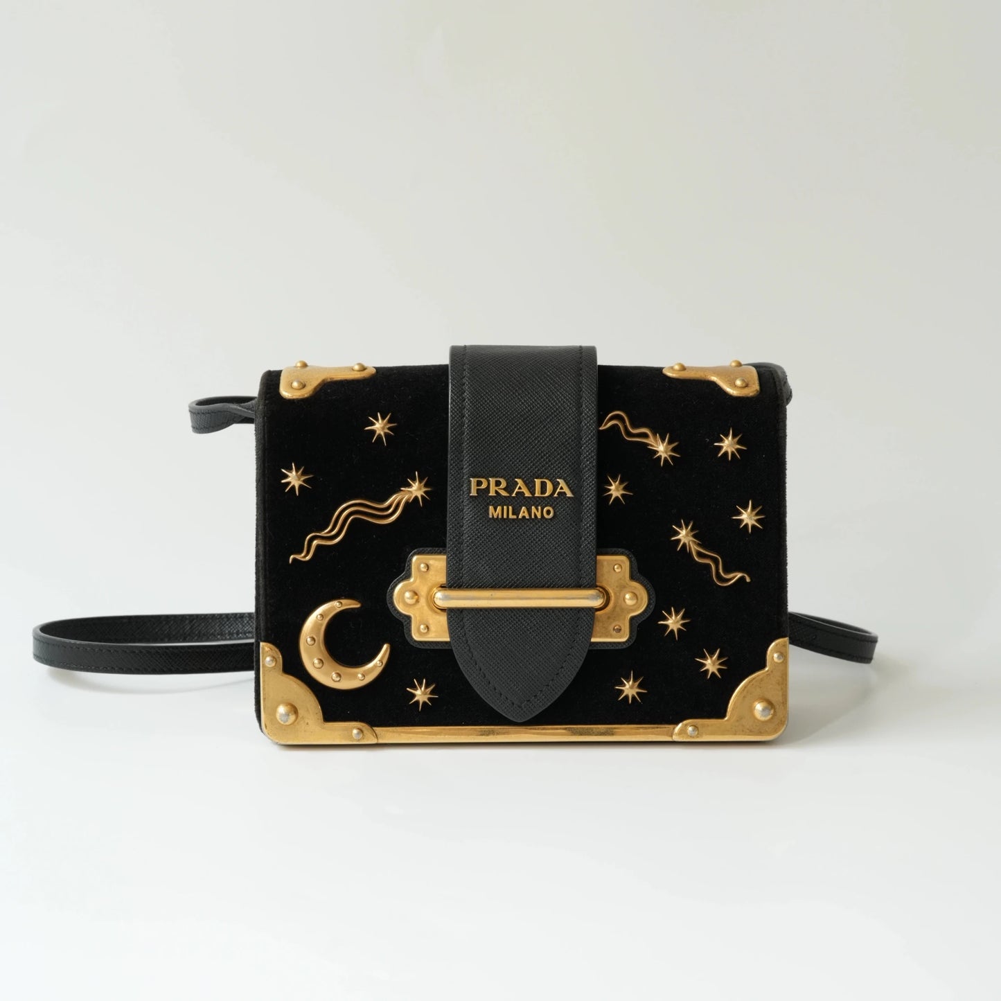 Front view of Prada Astrology Cahier bag in black velvet with gold moon and stars