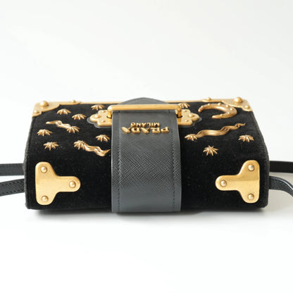 Top view of Prada Cahier bag with detachable crossbody strap