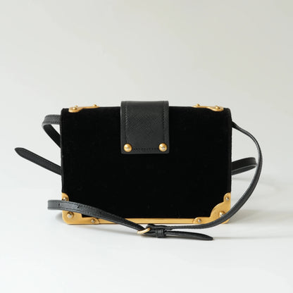 Back view of Prada Cahier bag in black velvet with Saffiano leather trim